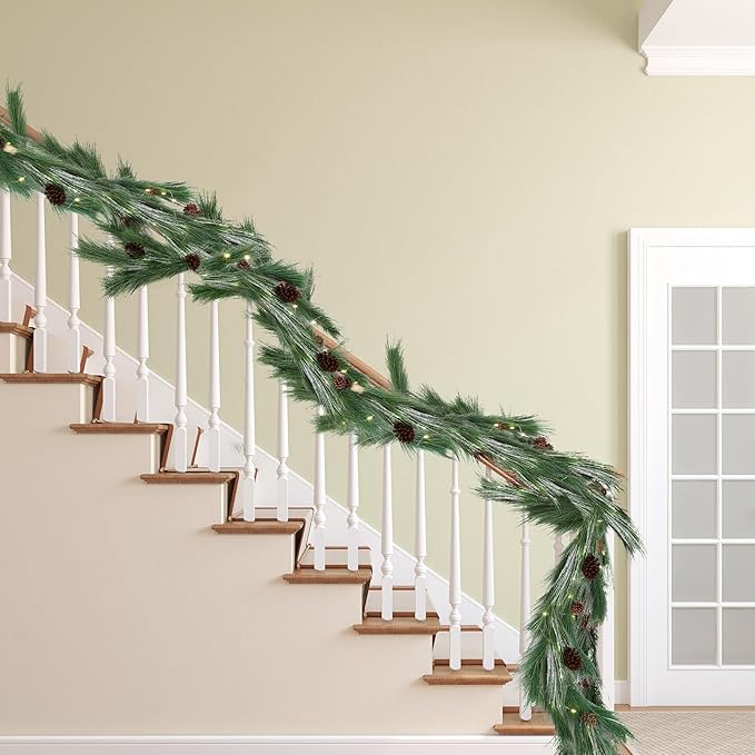 Jutom 9 ft Pre-lit Christmas Snowy Norfolk Pine Garlands White Frosted Real Touch Cedar Garland Artificial Long Needle Garland with Pine Cone Light for Xmas Mantle Table Stair Indoor Outdoor Decor