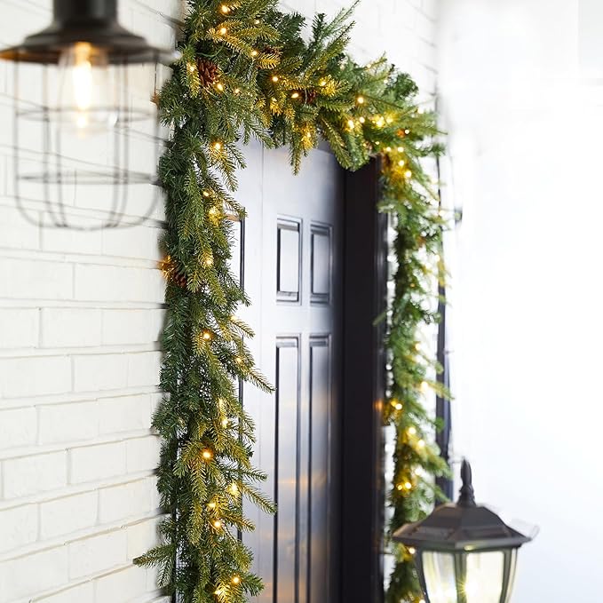 Glitzhome 9ft Pre-Lit Christmas Garland, Greenery Garland with Pine Cones Warm White LED Lights and Timer Pine Garland for Mantle Fireplace Stairs Front Door Window Christmas Party Decorations