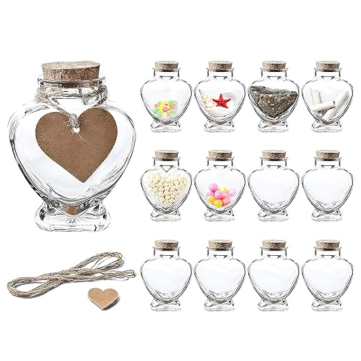 Set of 12 Heart Shaped Glass Jars with Cork Lids by WHOLE HOUSEWARES - Mini Bottles with String and Heart Labels - Small Spell Jars for Wedding Favors, Keepsakes, Potions and Valentine's Day Gifts